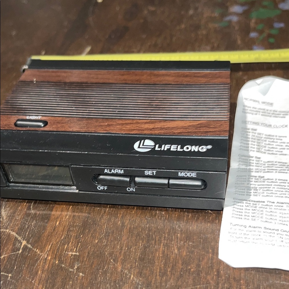 Black and Brown Electronic Alarm Clock